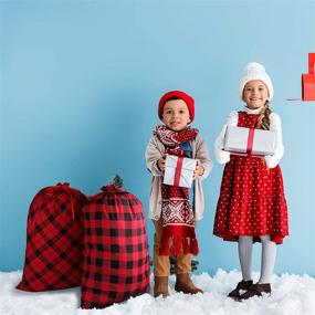 img 1 attached to 🎅 Анеко 2 упаковки Рождественской игрушечной мешочка Санты с клетчатым узором из хлопка для подарочной упаковки и сладостей на Рождественскую вечеринку, крупный размер 80 x 55 см