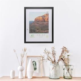 img 1 attached to 🖼️ Enhance Your Art with FrameWorks 2-Pack 16” x 20” Matted to 12 x 16 Black Wooden Dual Color Gunnabo Frames – Sleek Beveled Edges and Removable Classic White Mats Included!