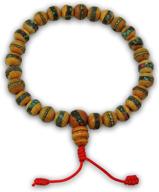 tibetan mala: handmade wrist mala with embedded medicine beads and draw string silk pouch logo