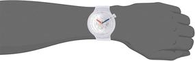 img 2 attached to Стильные и долговечные: часы Swatch Swiss Quartz с силиконовым ремешком и прозрачным дизайном.