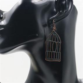 img 2 attached to 🦜 DIYANMMY Unique Personalized Hollow Bronze Asymmetric Bird Cage Earrings: Vintage Bohemian Hypoallergenic Jewelry for Women and Girls