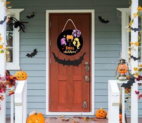 img 2 attached to CYNOSA Halloween Hocus Pocus Door Sign for Front Door - I Smell Children Hanging Sign, Rustic Wooden Door Hanger, Hocus Pocus Door Wreath with Bow - Black, Halloween Home Outdoor Wall Decor