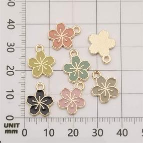 img 2 attached to WOCRAFT 60 pcs Gold Plated Enamel Cherry Blossoms Flower Charms: Perfect for DIY Jewelry Making!