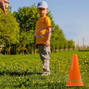 img 2 attached to 12-Piece Plastic Ring Toss Game Set for Kids - Outdoor Toss Rings for Speed, Agility, and Fun Practice Games, Assorted Colors (4.7 inch)