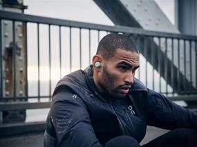 img 2 attached to 🎧 Беспроводные наушники Beoplay E8 Sport True Wireless In-Ear с Bluetooth от Bang & Olufsen с индивидуализированной посадкой, микрофонами и сенсорным управлением, беспроводным зарядным футляром, 28 часами воспроизведения, защитой от пыли и воды IP57.