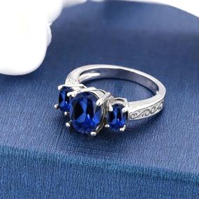 img 2 attached to 💍 Изысканное кольцо с 3 камнями Gem Stone King из 925 стерлингового серебра с синим созданным сапфиром для обручения женщин - овальный крой 3,51 карата, размеры 5, 6, 7, 8, 9 доступны