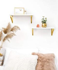 img 2 attached to 📚 Mkono White Floating Shelves: Stylish Wall-mounted Decor for Bathroom, Living Room, Bedroom, Kitchen, Office, and Nursery - Set of 2 Wooden Shelves with Golden Metal Brackets - 17 Inches