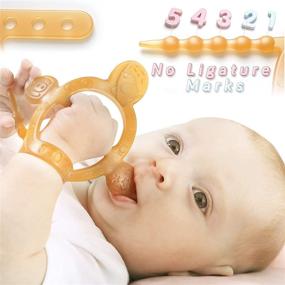 img 4 attached to 👶 HEORSHE Baby Teething Toys - never drop from hand! Silicone Molars Adjustable Wristband Chew Toys for Babies 0-6 6-12 Months. Ideal Teethers for Infants and Toddlers aged 3-12 Months.