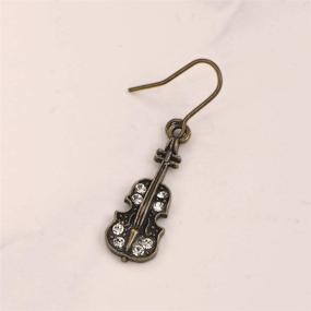 img 2 attached to 🎶 Antique Bronze Musical Instrument Dangle Earrings by Spinningdaisy: Classic Melodies for Fashion Enthusiasts