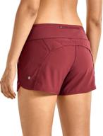 🩳 crz yoga women's mid-rise quick-dry athletic sports running workout shorts - stay secure with zip pocket - 4 inches logo