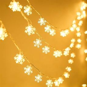 img 4 attached to 🎄 NITIDSKY Snowflake Lights: 30 LED Christmas Lights, Battery Powered Twinkle Snowflake String Lights with 8 Modes, Waterproof Xmas Light for Outdoor Indoor Room Decorations in Warm White