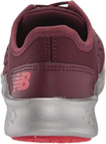 img 2 attached to Burgundy Velocity Girls' Athletic Shoes by New Balance for Running