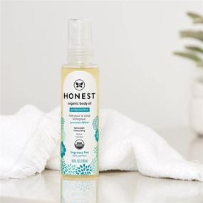 img 1 attached to 🌿 Honest Company Organic Body Oil: Certified Organic, All-Natural, Plant-Based, Hypoallergenic, Lightweight, Biodegradable Blend with Jojoba, Tamanu, Olive, Avocado & Sunflower Oil - 4 fl oz