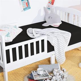img 1 attached to 🛏️ NTBAY Microfiber Crib Fitted Sheet - Cozy and Soft Solid Color Toddler Bedding - Black - 28 x 52 Inches