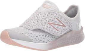 img 4 attached to Step into Style with New Balance Running Champagne Metallic Girls' Shoes and Athletic