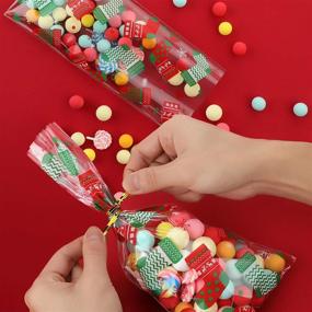 img 1 attached to 🎁 135-Count Christmas Cellophane Bags: 9 Styles with Festive Elements - Holiday Wedding Candy Treat Bags for Christmas Festivals. Includes 200 Twisted Ties for Party Supplies