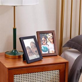 img 2 attached to 🖼️ Ophanie 5x7 Natural Wood Photo Frame with Versatile Display Options, Back Stand and Clear Plexiglass Cover Included - Black