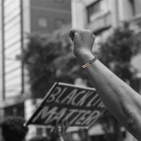 img 1 attached to Black Lives Matter Bracelet: Silicone Wristbands in Set of 10 - Black Rubber Bangle Bracelets