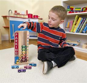 img 3 attached to 🚗 Melissa & Doug Stack & Count Wooden Parking Garage With 10 Cars: Fun and Learning in One Toy!