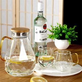 img 2 attached to 🥛 Enhanced SJZQ Diamond Glass Pitcher with Lid: 60OZ Glass Kettle with Bamboo Lid - Optimal for Iced Juice, Tea, Coffee, and Milk Jug - Refrigerator and Microwave Safe