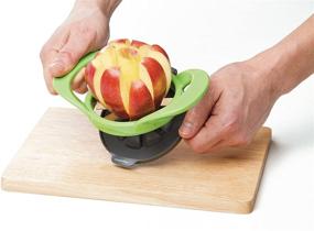 img 2 attached to Progressive Prepworks Wedge and Pop Apple and Pear Slicer - 8 Slices, Attached Safety Cover for Finger Protection During Use and Blade Safety in Storage