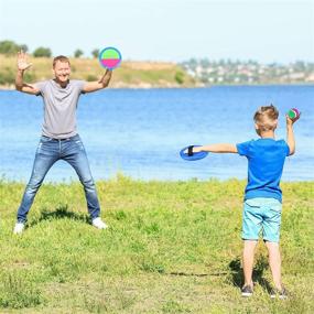 img 2 attached to 🏸 Kids Toss and Catch Ball Set, MENOLY Paddle Ball Games Kit, Sticky Ball Catch Game with 4 Paddles and 8 Balls for Outdoor Activities, Beach, Yard