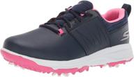 skechers girl's finesse spiked golf shoe in navy/pink - size 2 m us big kid logo