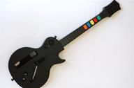 🎸 black wireless guitar for wii guitar hero and rock band games logo