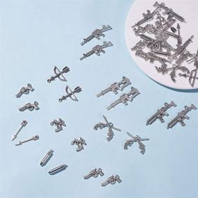 img 1 attached to SUNNYCLUE 40Pcs 10 Styles Gun Pistol Revolver Weapon Charms Pendants - Jewelry Making Supplies for DIY Bracelet Accessory - Lead Free Nickel Free Cadmium Free