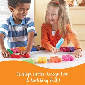 img 2 attached to 🔠 Learning Resources Smart Snacks Alpha Pops: Alphabet Learning & Fine Motor Skills Toy for Kids - Develops Letter Recognition and ABC Skills with 26 Double Sided Pieces (Ages 2+)