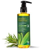 🌿 desert essence thoroughly clean face wash - tea tree oil - 8.5 fl oz - gentle cleanser for soft radiant skin with goldenseal, awapuhi & chamomile essential oils logo