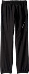 img 1 attached to 👖 Nike Dri-FIT зауженные костюмные брюки для мальчиков (маленькие дети/большие дети)