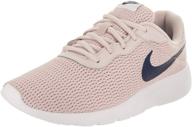 👟 nike girl's tanjun shoe: barely rose/navy/white, size 7 m us - elegant and cool logo