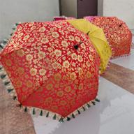 handmade decorative umbrellas by world of textile логотип