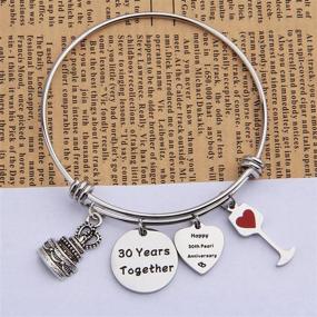 img 2 attached to FEELMEM Adjustable Wedding Anniversary Bracelet Bangle with Anniversary Cake Charm - Perfect Anniversary Gift for Her | 1st, 2nd, 5th, 10th, 25th, 30th Bangle Gift