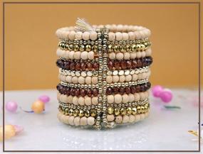 img 1 attached to Unique Handcrafted Tribal Chic Wooden Bead and Spiral Cuff Bracelet - A natural, stylish accessory!