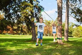 img 2 attached to 🌳 Optimized 60ft Slackline Kit with Training Line, Tree Protectors, Premium Ratchet + Cover, Arm Trainer, Instruction Booklet, and Carry Bag - Complete Slack Line Set for Kids and Adults