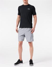 img 3 attached to Gear up in Style: Under Armour Men's Woven Graphic Shorts