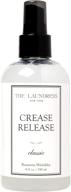 the laundress - crease release, classic scented, wrinkle release spray for clothes, shirts, suits, curtains & more - anti wrinkle remover, 8 fl oz logo