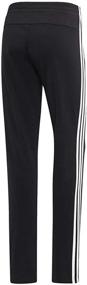 img 2 attached to 👖 Get Active in Style with adidas Women's Essentials 3-Stripes Tricot Open Hem Pants