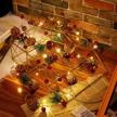christmas garland operated decorations fireplace seasonal decor and wreaths, garlands & swags logo