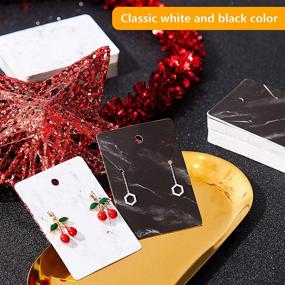 img 2 attached to 800-Piece Earring Necklace Card Jewelry Display and Holder Set with 200 Marble Display Cards, 200 Self-Seal Bags, and 400 Earring Backs - Black and White
