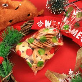 img 2 attached to 🎄 Christmas Cellophane Treat Bags - Red and Green Polka Dot Design - Plastic OPP Candy Bags with Ribbon - Ideal for Christmas Party Supplies - Pack of 100