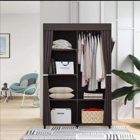 img 2 attached to YIZAIJIA 34 Inch Portable Wardrobe Closet: Metal-Shelved Clothes Organizer with Dustproof Non-Woven Fabric (Coffee)