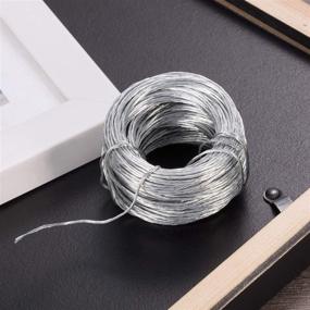 img 2 attached to 📸 Jovitec 100 Feet Stainless Steel Picture Hanging Wire - Heavy-Duty Mirror Hanging Rope, Supports up to 30 lbs