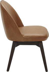 img 1 attached to 🪑 Rivet Contemporary Leather Swivel Dining Chair, 33"H, Cognac - Amazon Brand