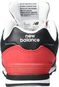 img 2 attached to 👟 New Balance Kids' 574 V1 Shadow Logo Sneaker with Lace-up Closure