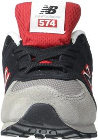 img 3 attached to 👟 New Balance Kids' 574 V1 Shadow Logo Sneaker with Lace-up Closure