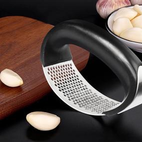 img 1 attached to KUFUNG Garlic Press, Stainless Steel Garlic Mincer - Arc Shape Design, Premium Garlic Crusher with Comfortable Grip, Black, M