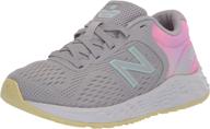 kid's fresh foam arishi v2 lace-up running shoe by new balance logo